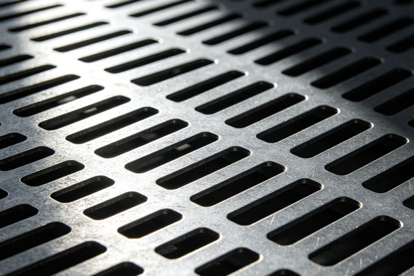 Perforated metal sheet with elliptical holes